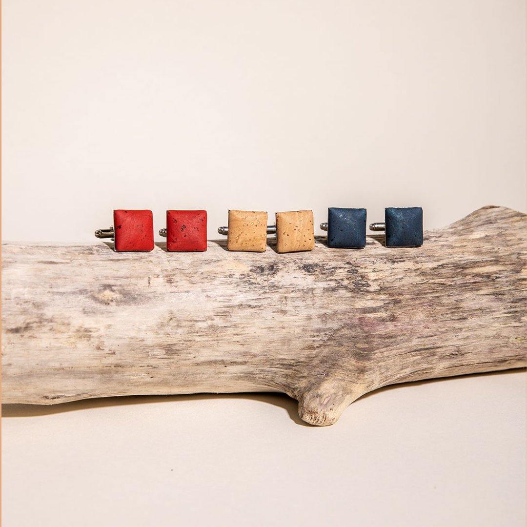 a wooden table with a red suitcase on it