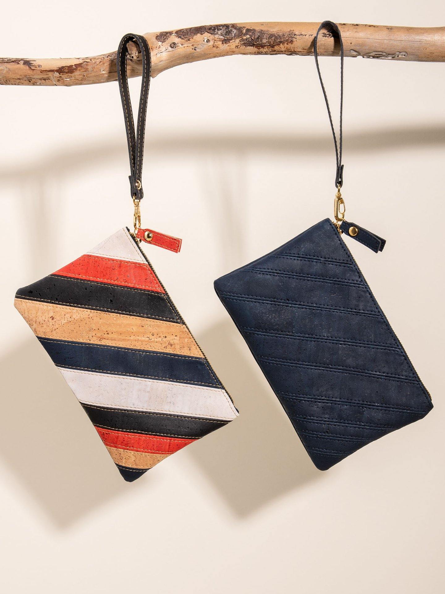 a couple of flags are hanging on a rope