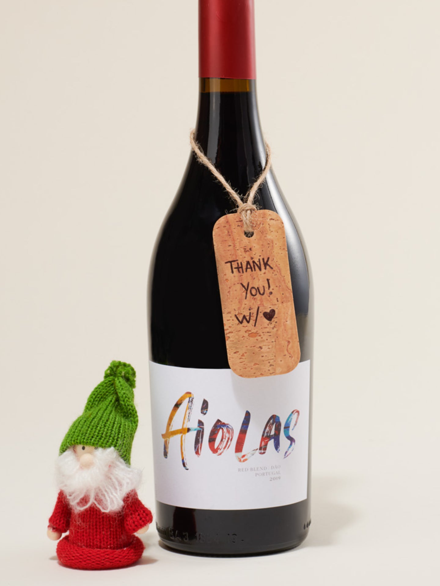 a bottle of wine next to a bottle of wine