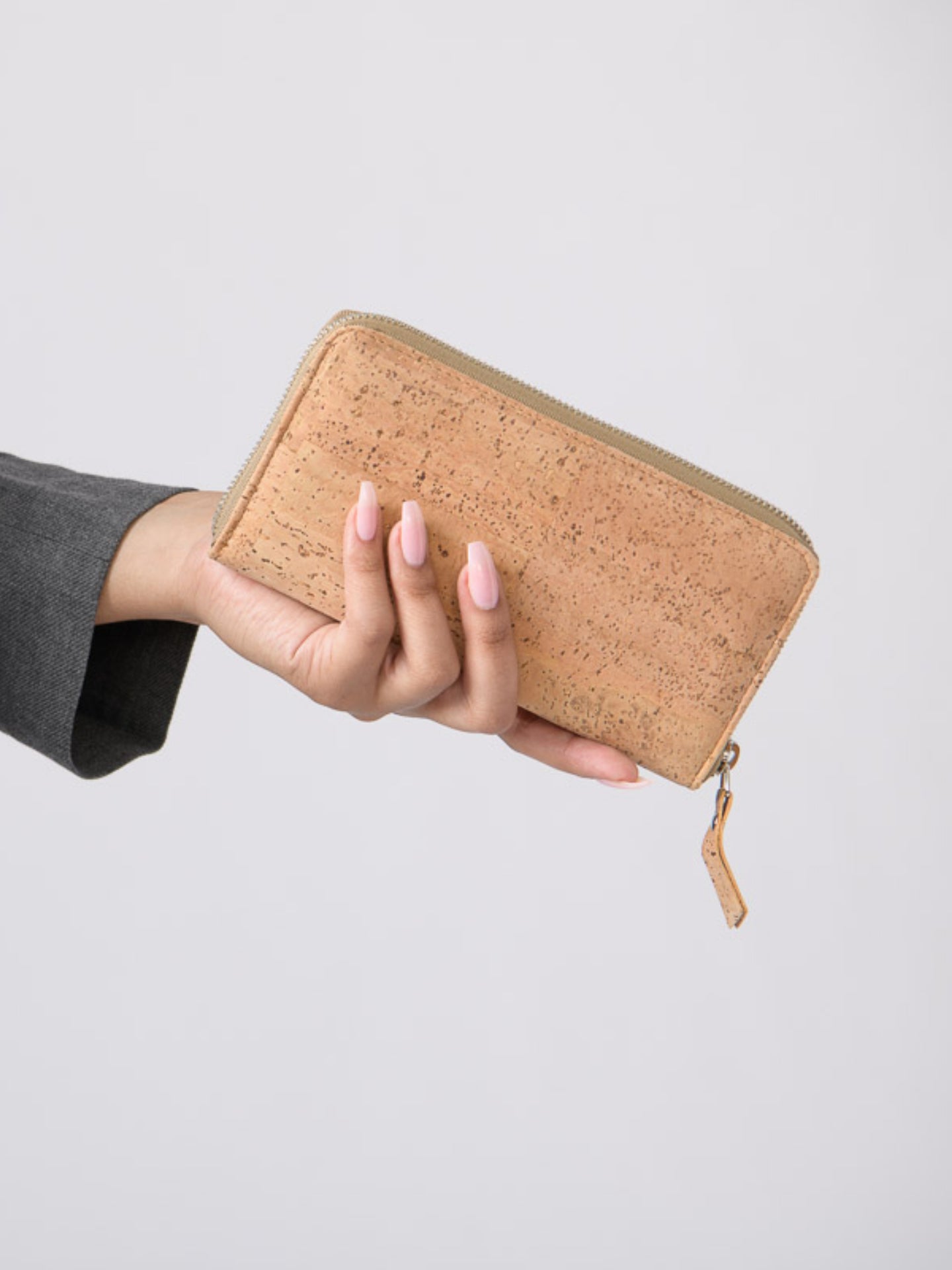 a person holding a piece of paper in their hand