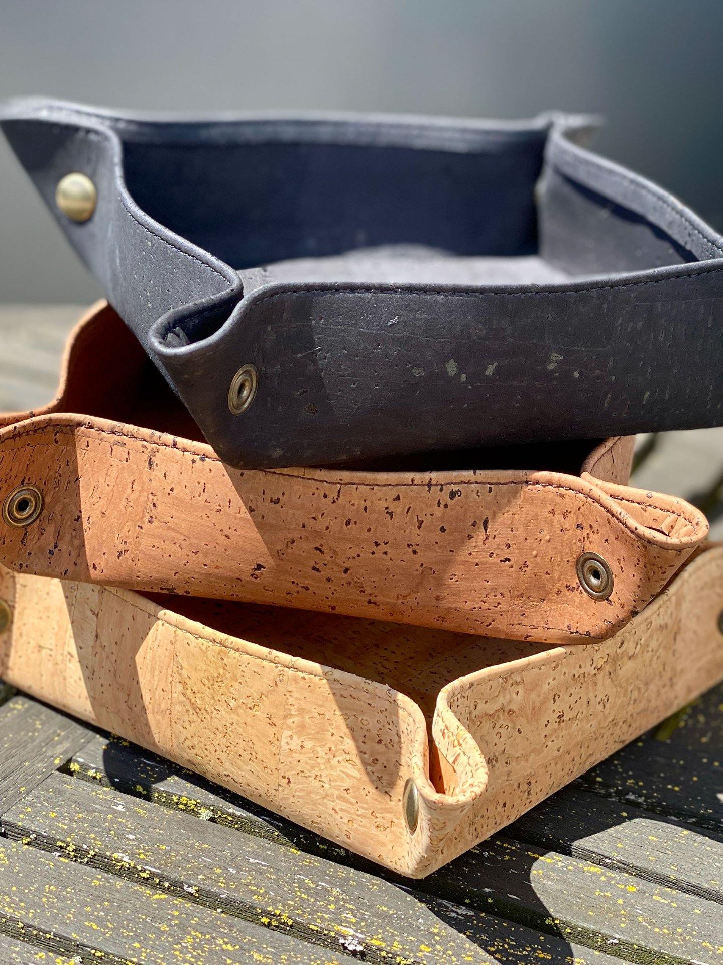 a pair of black scissors sitting on top of a box